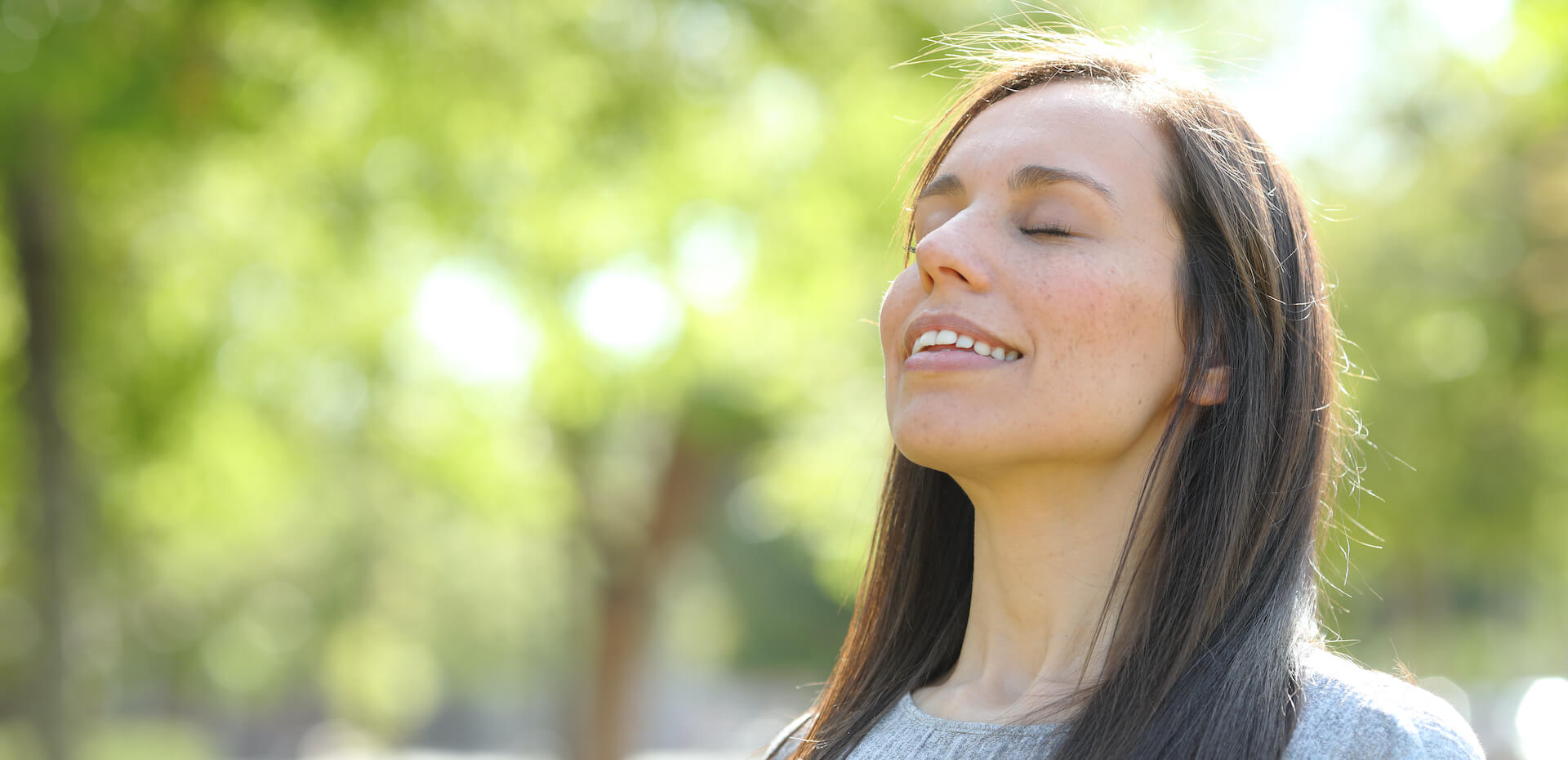 woman smiling outside